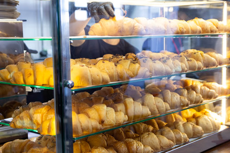 Fresh delicious croissants on display in the bakery. Foodの写真素材