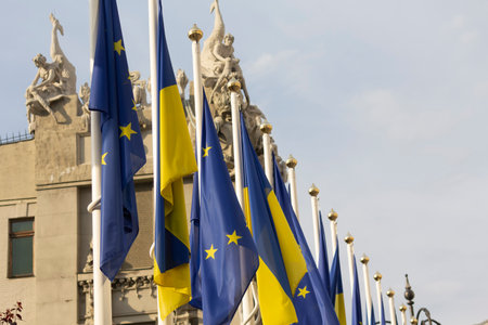 Flags of Ukraine and the European Union on flagpoles near the office of the President of Ukraine. Kyivの写真素材