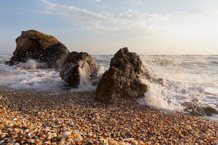 Waves collide with stones on the seashore. Crimeaの写真素材