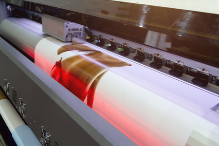 Large format printing machine in operation. Industryの写真素材