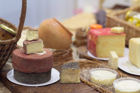 Craft cheese on the farmer's market counter. Foodの写真素材