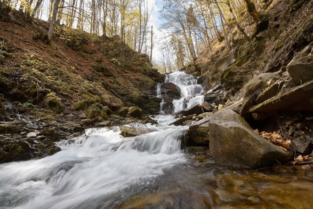Beautiful Waterfall Shipot in the autumn forest of the Carpathian Mountains. Ukraineの写真素材