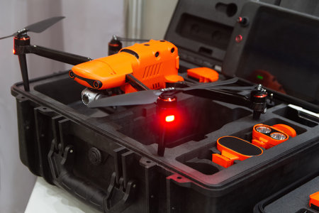 A drone with a camera in a box on a store shelf. Technology