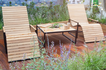 Natural wooden chairs on a patio for relaxation. Interiorの写真素材