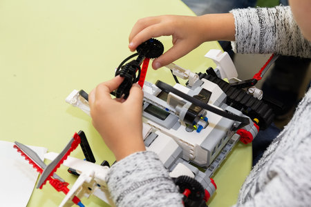 Children are working on model assembly in robotics class. Educationの写真素材