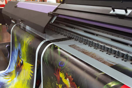 Large format printing machine in operation. Industryの写真素材