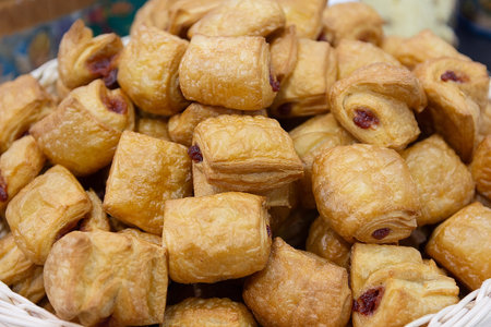 Delicious golden rolls with jam. Food