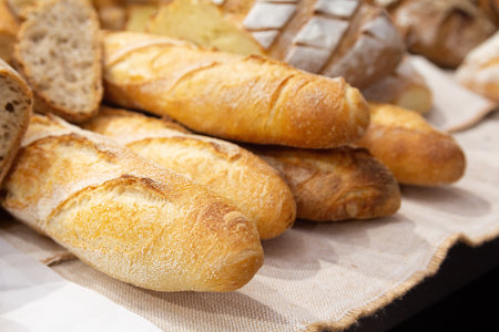 Delicious fresh bread on the bakery counter. Food