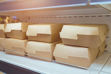 Cardboard boxes on the grocery store counter. Ecological packaging
