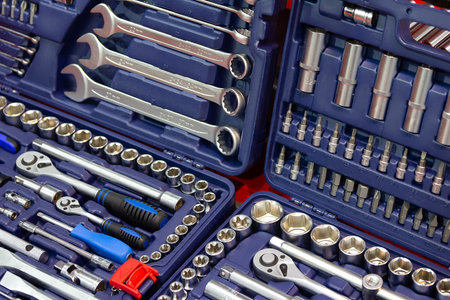 Box with set of tools for car repair close-up. Industry