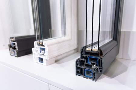 Samples of the profile of modern PVC windows on the showcase. Industry