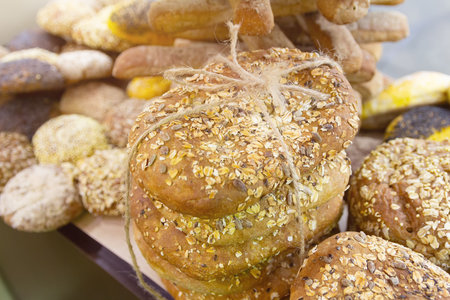 Fresh grain bread on a counter of the grocery store. Foodの写真素材