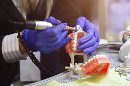 Dental technician or prosthesis worker. prosthetic dentistry process. Industry