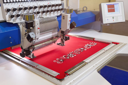 Automatic embroidery machine in the home textile industry. Garment industry