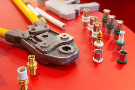 Hand press for water pipes PEX - AL - PE-X. Plumbing industry