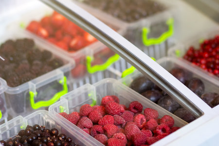 Frozen acai berry on a deep freezer in a supermarket. Foodの写真素材