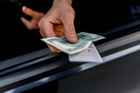 Close-up of a bribe on the road.の写真素材