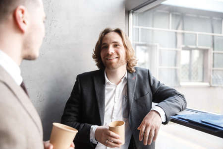 Colleagues chatting on a coffee break