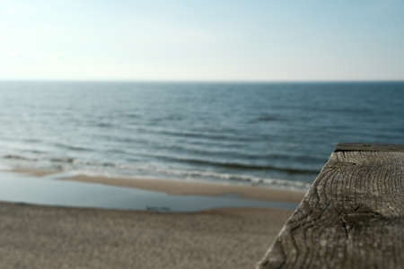 Sea waves lash line impact rock on the beach. beautiful sea view with stonesの写真素材