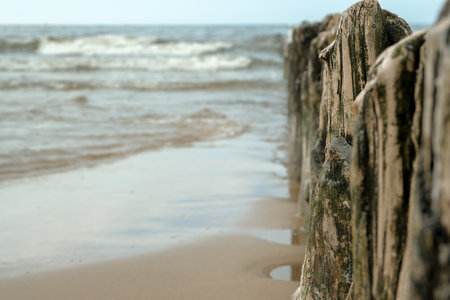 beautiful seashore. stone coast. , Beautiful beach with sand, rocks and wavesの写真素材