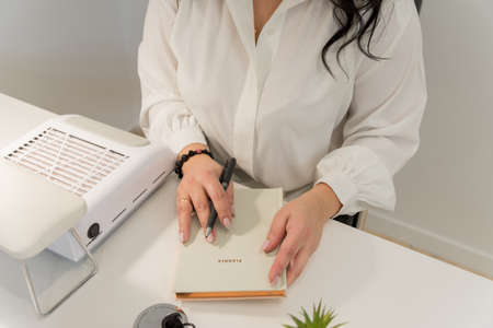 child walks in the park. little girl dressed in a blue dress.