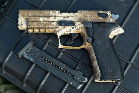 gun close-up. combat pistol. weapon. pistol magazine