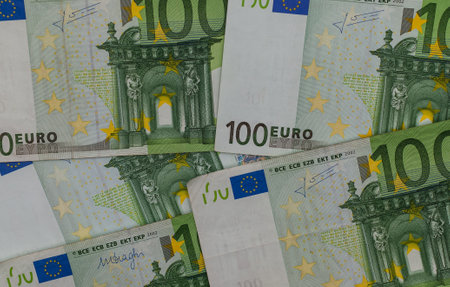 Pile of 100 euro banknotes close-up.の写真素材