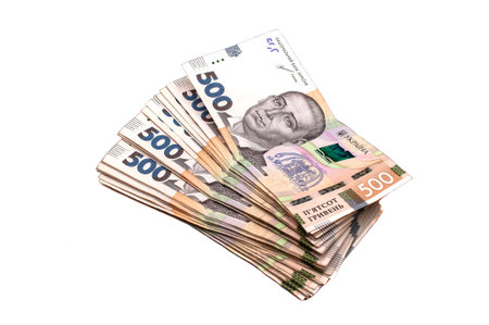 A stack of five hundred hryvnia banknotes on a white backgroundの写真素材