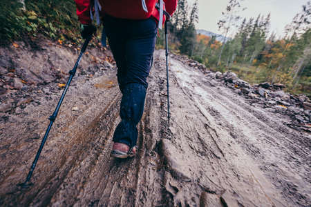 A woman cross country skiing on a mountainの写真素材