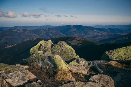 A canyon with a mountain in the backgroundの写真素材
