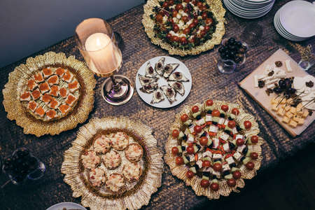A decorated cake on a plate A cake sittingの写真素材