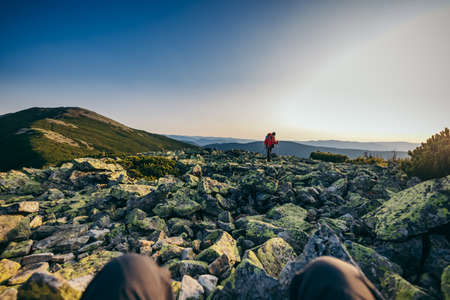A group of people on a rockの写真素材