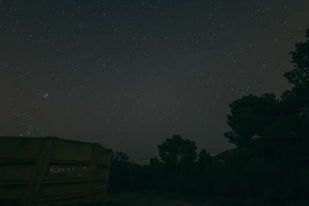 A street sign at nightの写真素材