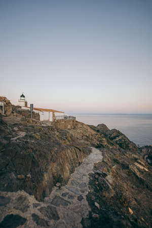 A close up of a rock near the oceanの写真素材