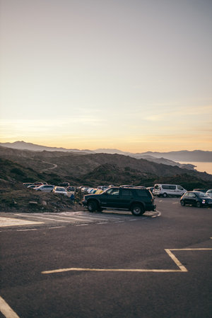 A plane parked on the side of a mountain roadの写真素材
