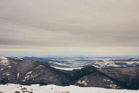 A close up of a snow covered mountainの写真素材