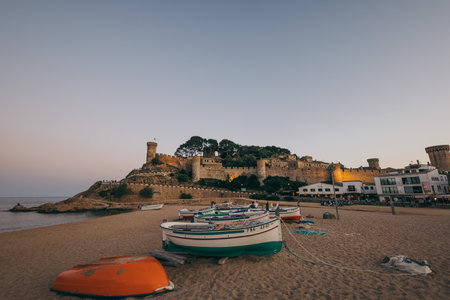 A boat sitting on top of a beachの写真素材