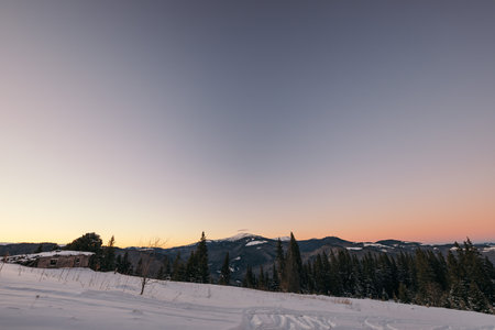 A close up of a snow covered mountainの写真素材