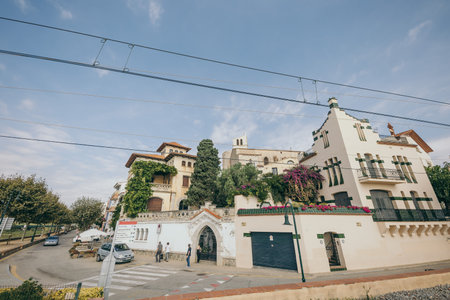 A building with a store on the side of a roadの写真素材