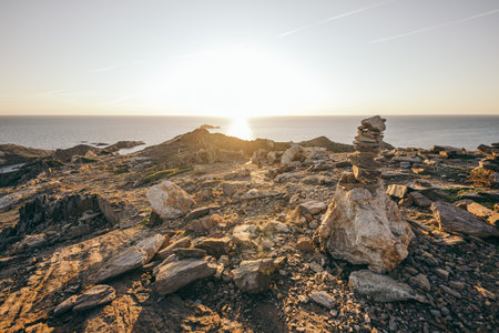 A group of people on a rocky hillの写真素材