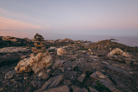A group of people on a rocky hill
