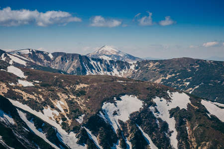 A view of a snow covered mountainの写真素材