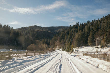 A snow covered road travelの写真素材