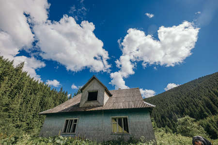 A house with a mountain in the backgroundの写真素材