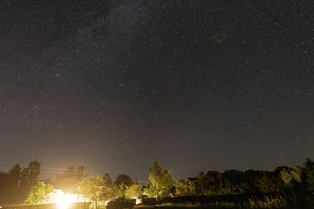 A sign in front of a sunsetの写真素材
