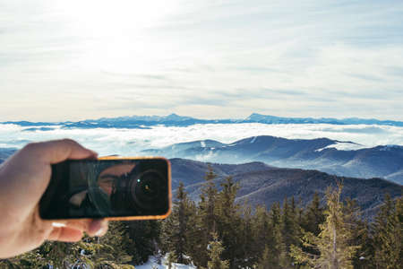 A close up of a snow covered mountainの写真素材
