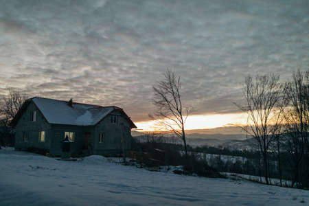 A house covered in snowの写真素材