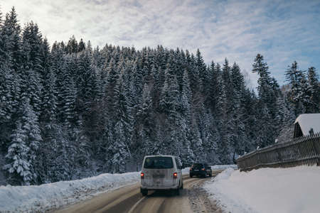 A snow covered road travel