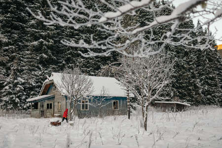 A house covered in snowの写真素材