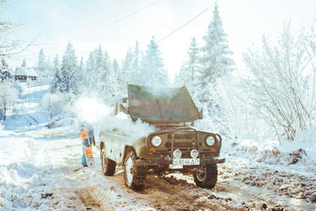 A truck covered in snowの写真素材
